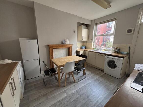A bright and functional kitchen area with natur...
