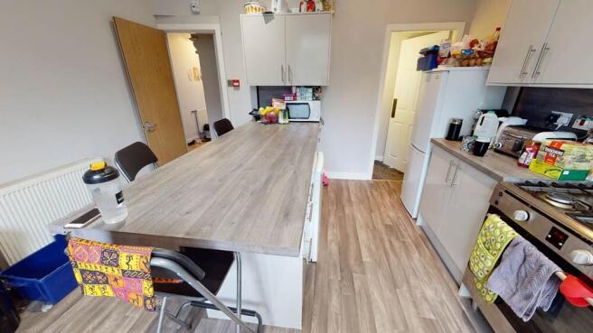 A well-lit, modern living room with ample space...