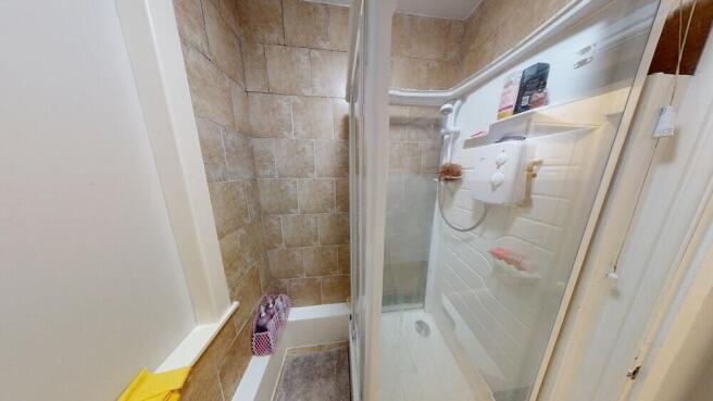 A clean and well-maintained bathroom with a lar...