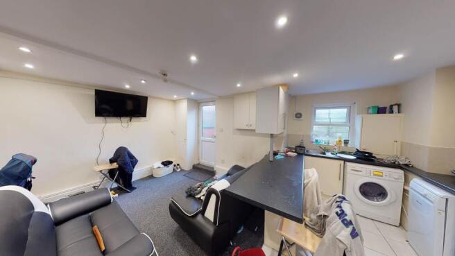 Bright and spacious living room featuring moder...