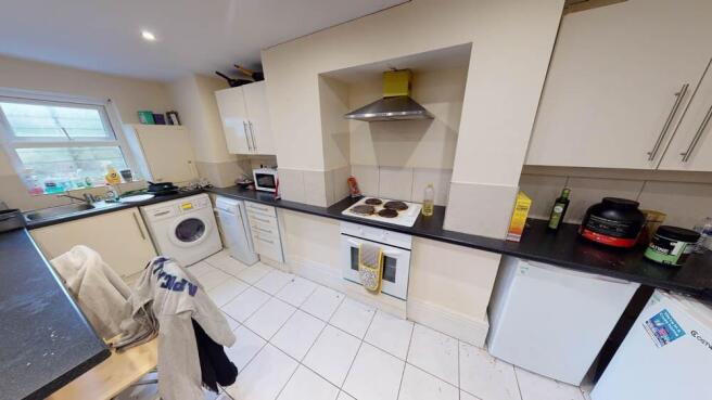 A bright, well-maintained kitchen featuring mod...