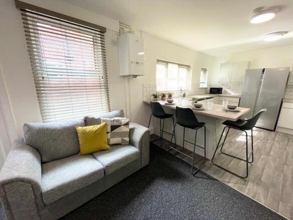 Bright open-plan living area with a comfortable...