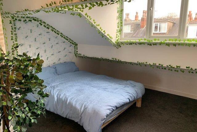 Bright double bedroom with a comfortable bed, l...