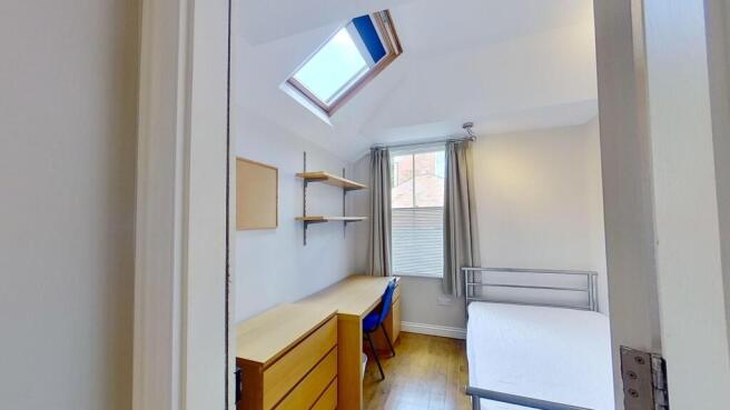 Bright, neatly presented single bedroom with a ...
