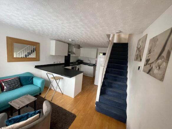 A spacious and inviting large modern living roo...