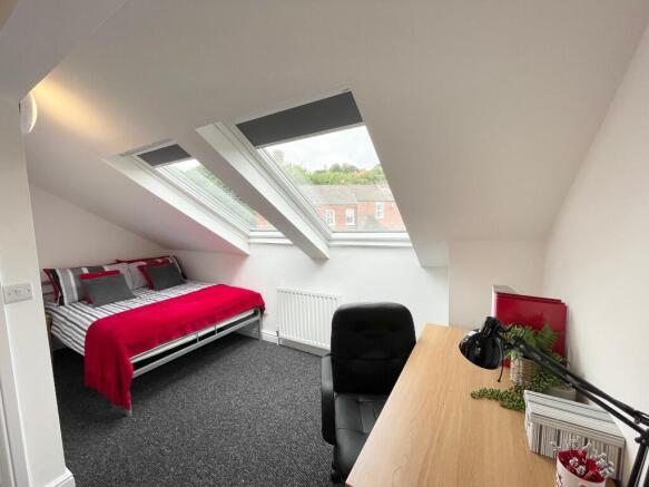 Bright, recently decorated attic double bedroom...