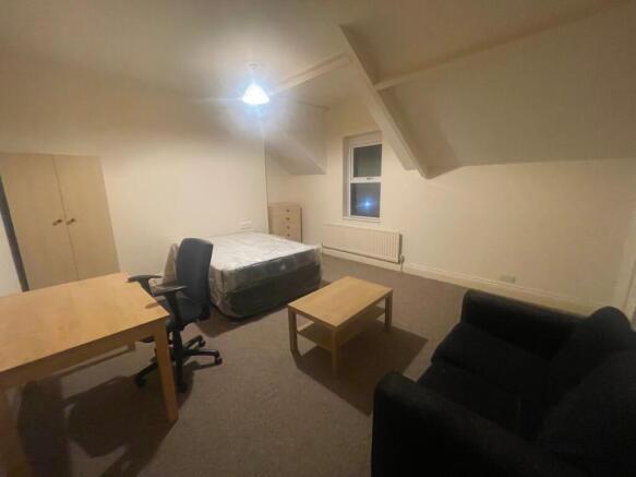 Spacious furnished double bedroom with a double...