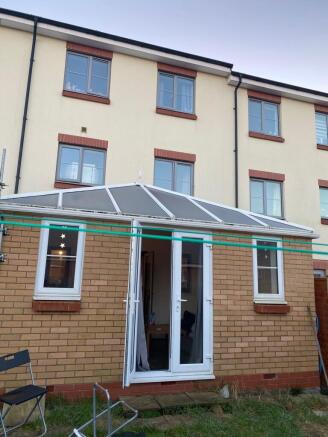 Well-maintained terraced property rear view wit...