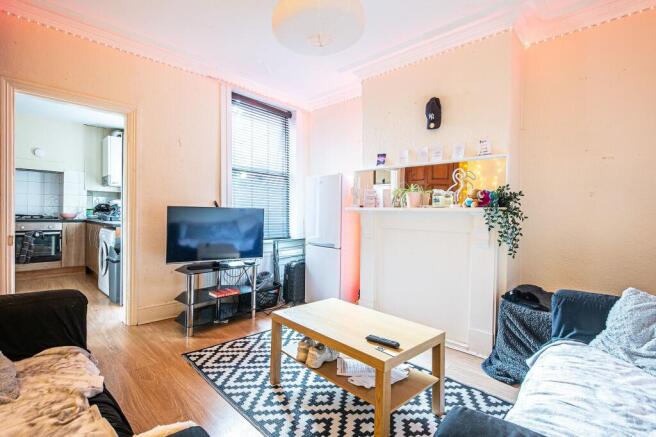 Bright, relaxed living room with comfy seating,...