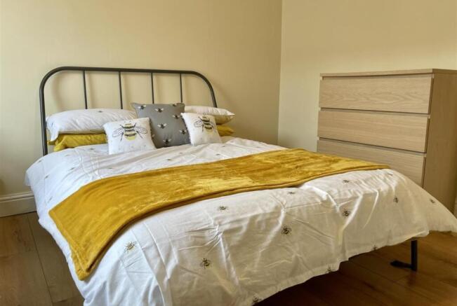Bright, neatly presented double bedroom with a ...