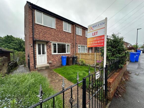 Brick-fronted semi with a small fenced front ga...