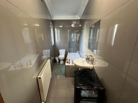 A modern and well-maintained bathroom with a sp...