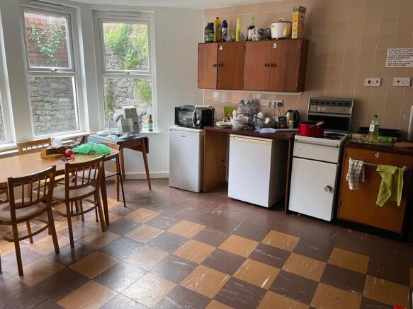 A cozy kitchen space featuring ample counter sp...