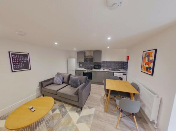 A stylish and spacious modern living room perfe...