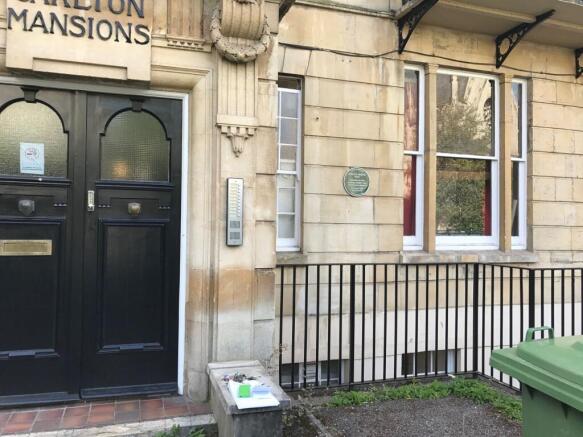 Stately sandstone building entrance with decora...