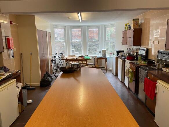 Spacious kitchen area featuring ample counter s...