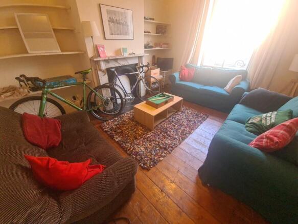 A cozy and inviting living room filled with nat...