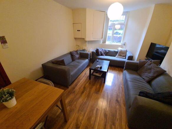 Bright and inviting living room with comfortabl...