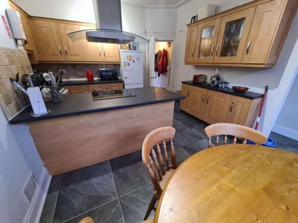 A bright and spacious living room with modern f...