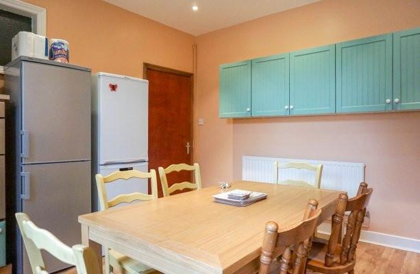 Bright, homely kitchen/dining area with a large...