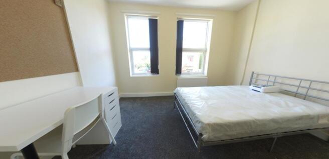 Bright, neatly presented double bedroom with a ...