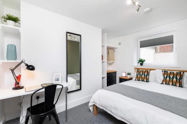 Bright, neatly presented double bedroom with a ...