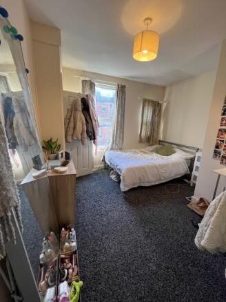 Bright double bedroom with a comfy bed, natural...
