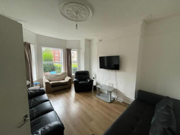 A spacious and inviting large modern living roo...