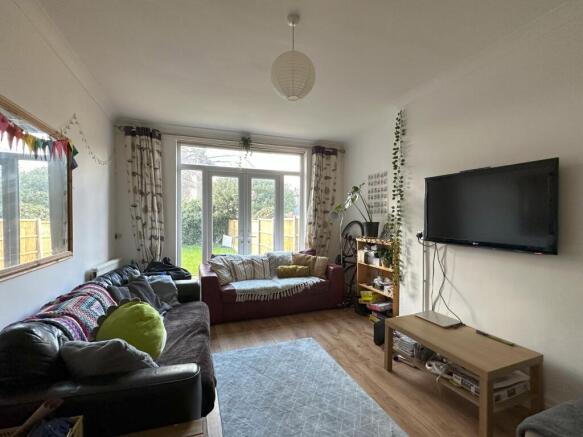 A spacious and bright modern living room with l...