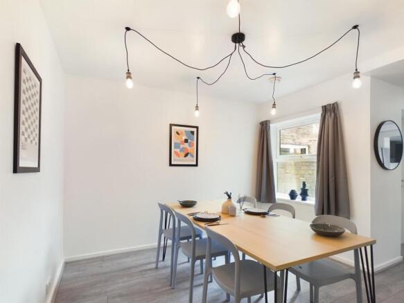A spacious and stylish modern living room perfe...