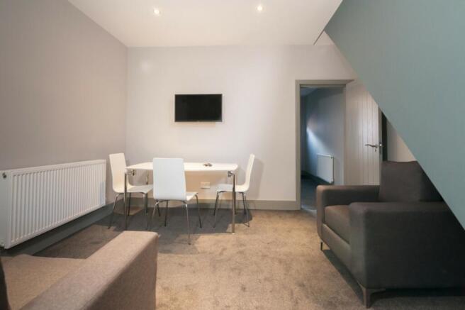 A stylish and inviting living room perfect for ...