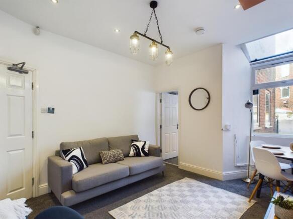 A bright and inviting living room perfect for s...