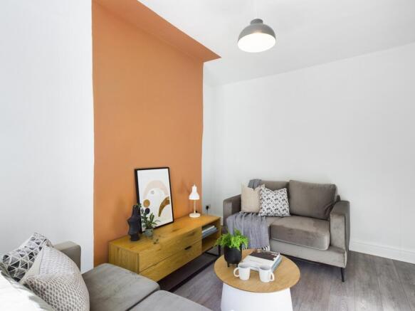 A stylish and spacious living room with modern ...