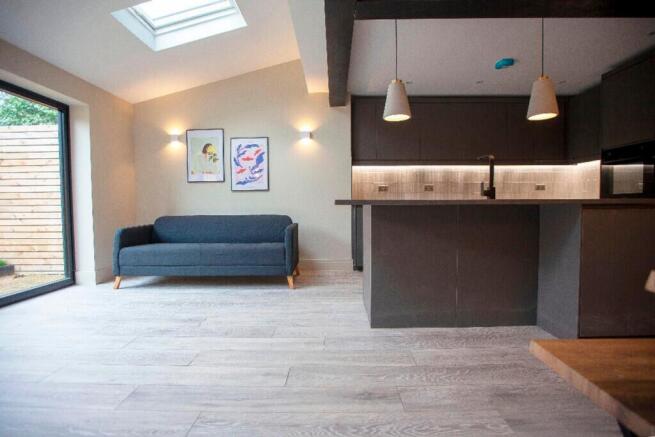 A stylish and spacious modern living room with ...