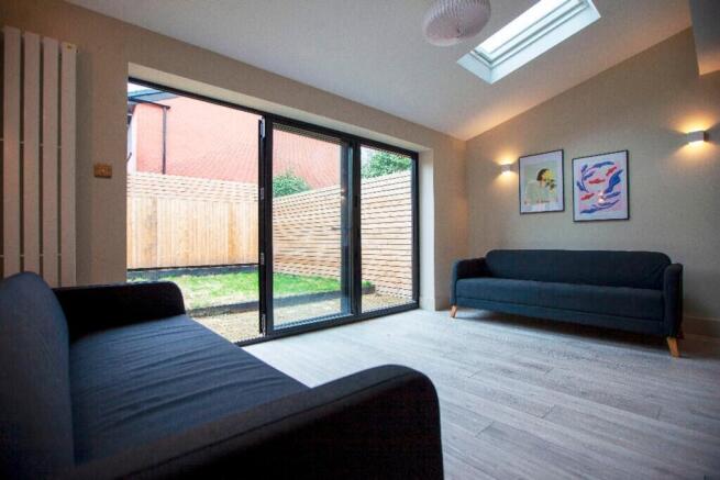 A spacious and inviting large modern living roo...