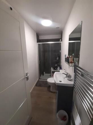 Modern and well-maintained bathroom featuring a...