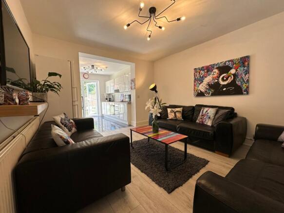 This stylish living room features contemporary ...