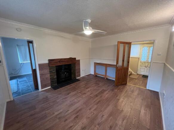 This inviting living room features a spacious d...