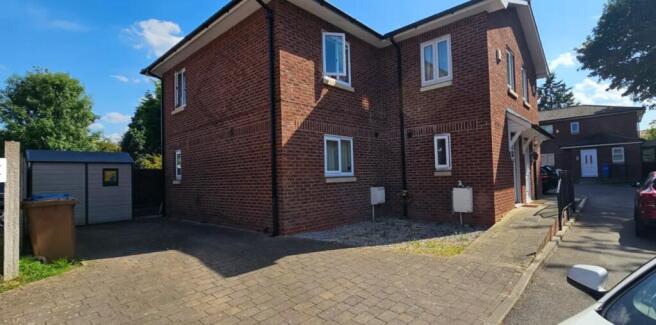 Charming view of the property's exterior, showc...