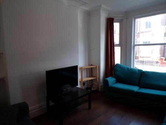 Bright and inviting living room featuring moder...