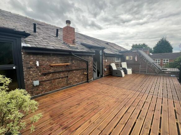 Enjoy a spacious outdoor terrace perfect for re...
