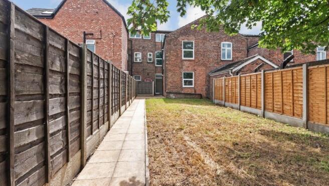 A beautifully maintained garden space featuring...
