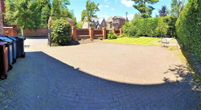 A spacious and well-maintained garden area with...