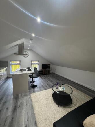 A stylish and contemporary living area featurin...