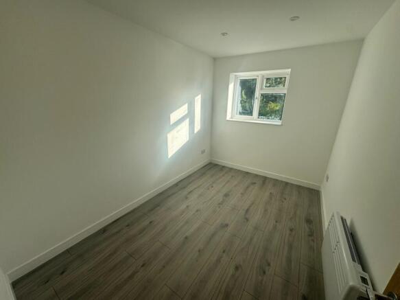 Bright room with a clean, minimalistic design f...