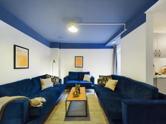 A stylish and spacious modern living room, perf...