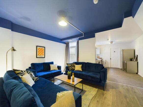 A spacious and stylish modern living room, perf...