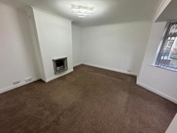 Bright and spacious master bedroom featuring a ...