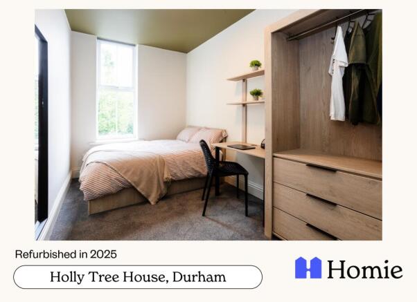 Bright and welcoming bedroom featuring a cozy d...