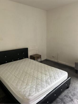A spacious and clean double bedroom ready for s...